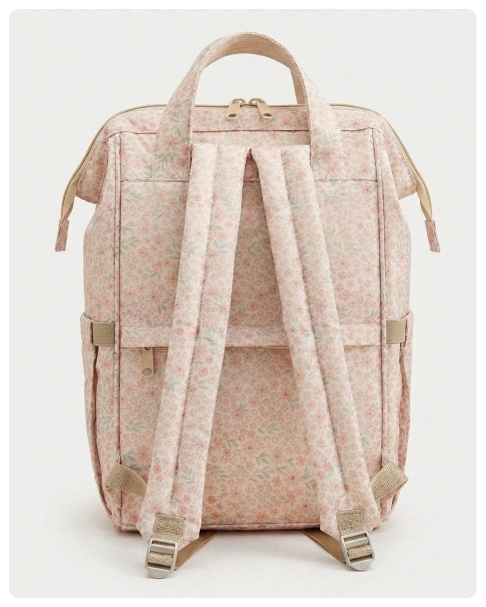 Mochila maternal flores rosadas