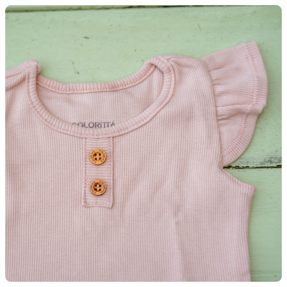 Remera algodón rosada con voladitos