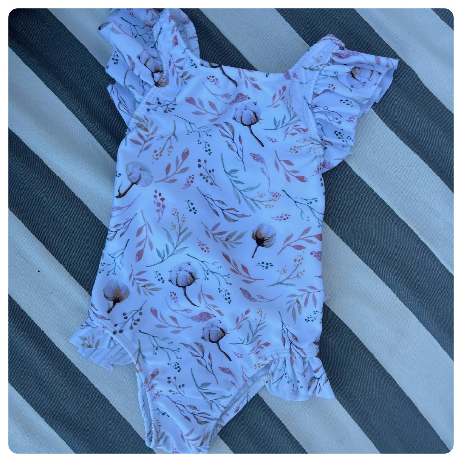 Traje de baño Brillantina blanco ramitas rosa