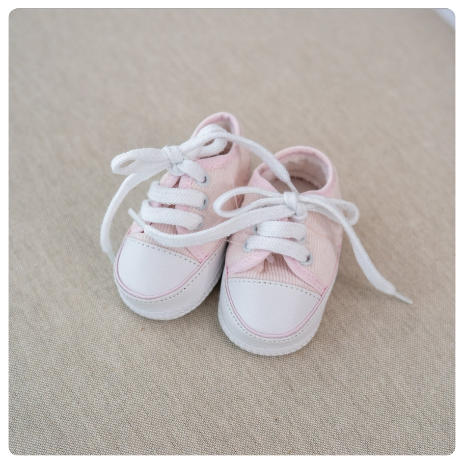 Zapatitos rosados cordones