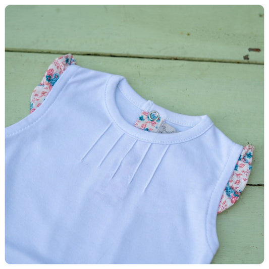 Body algodón manga corta voladitos flores celestes