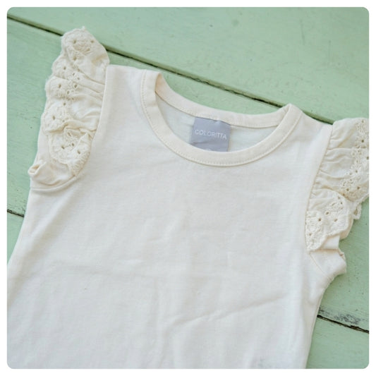 Remera beige con broderie