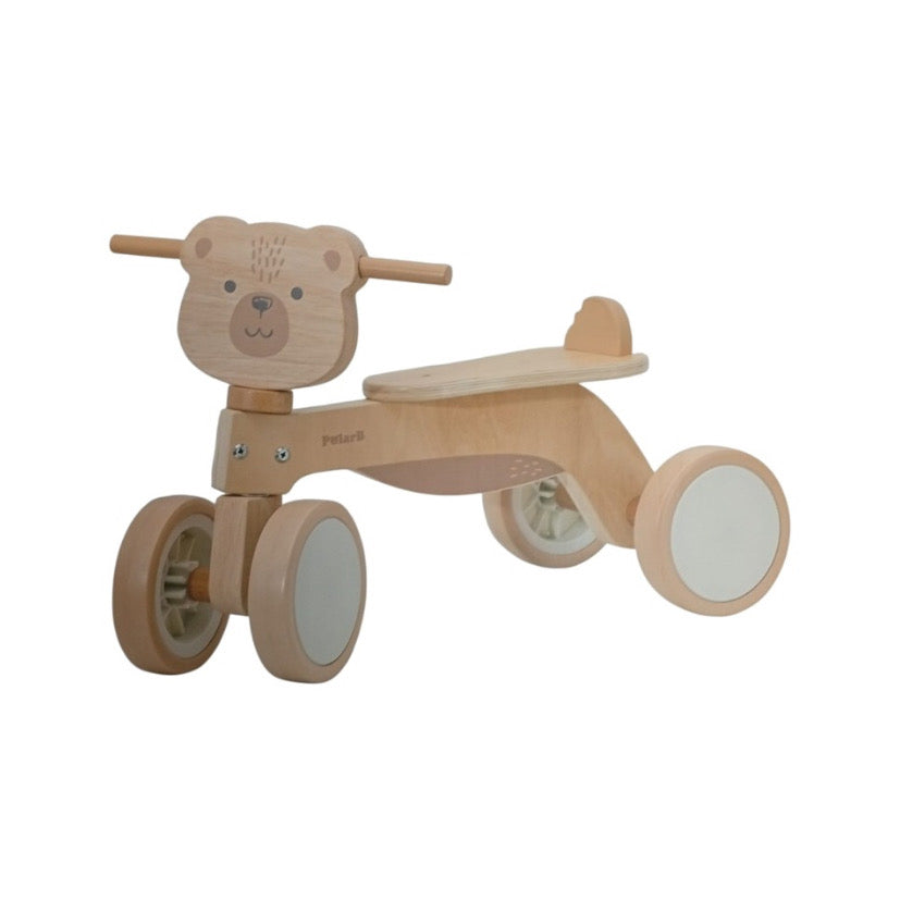 Triciclo de madera beige