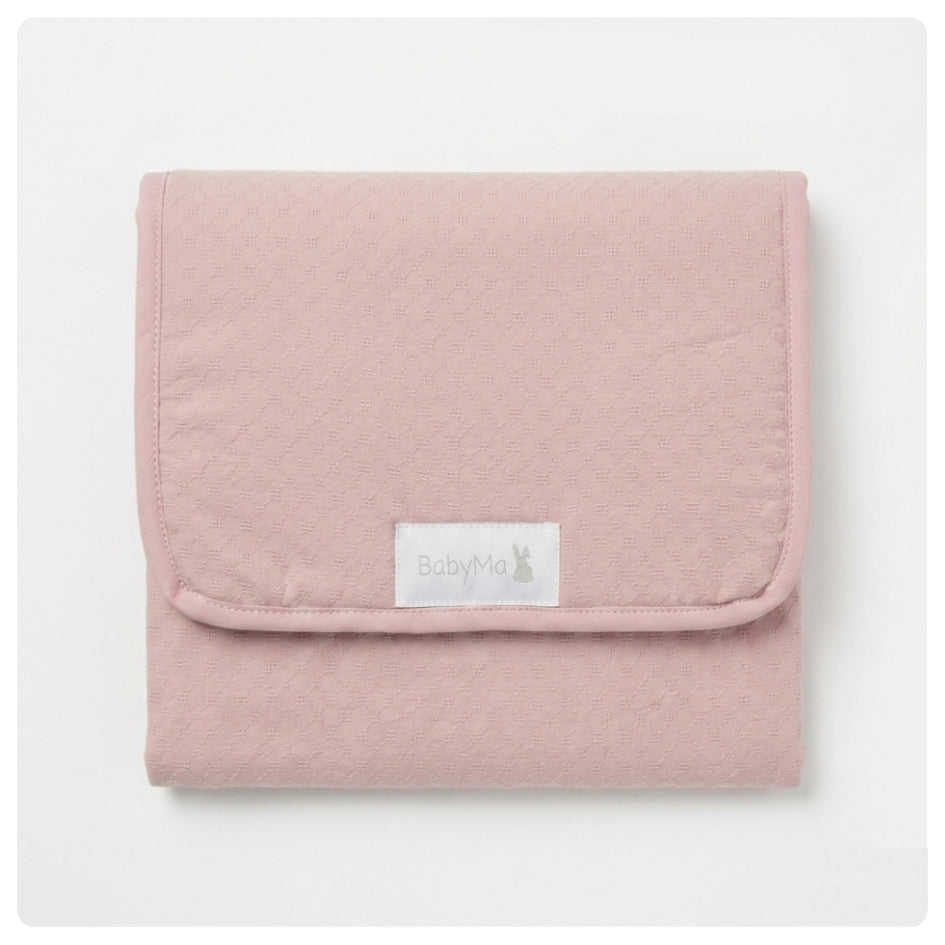 Cambiador portátil con bolsillos rosado