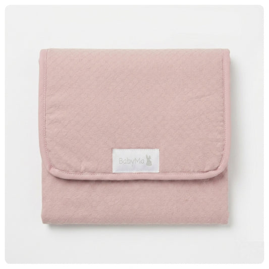 Cambiador portátil con bolsillos rosado