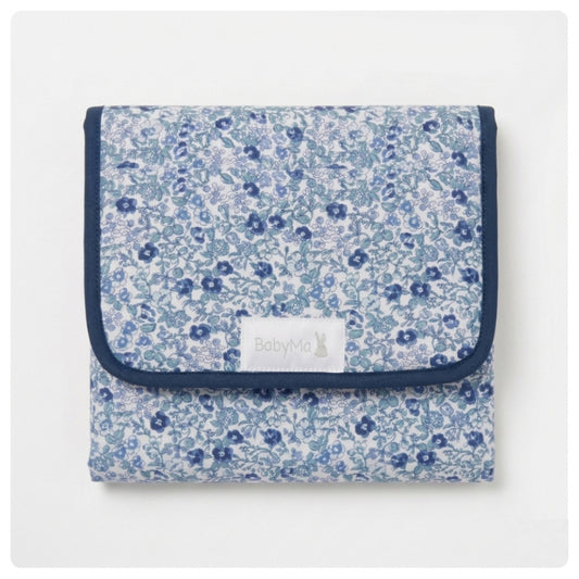 Cambiador portátil con bolsillos Flores azules