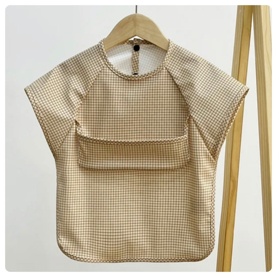 Babero impermeable cuadros beige